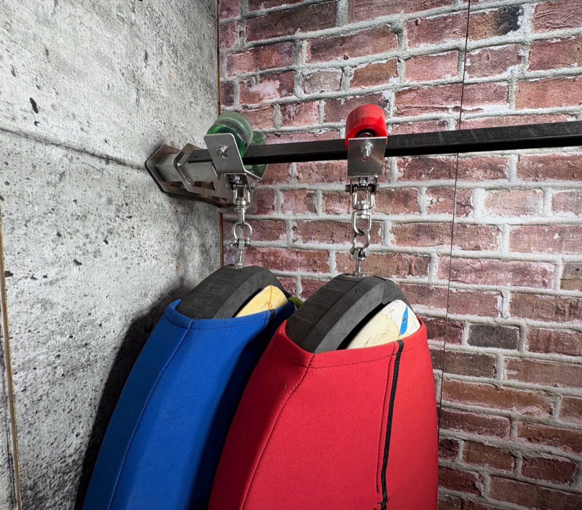 Radd Raxx board cradle and skate-wheel hardware on the slide track