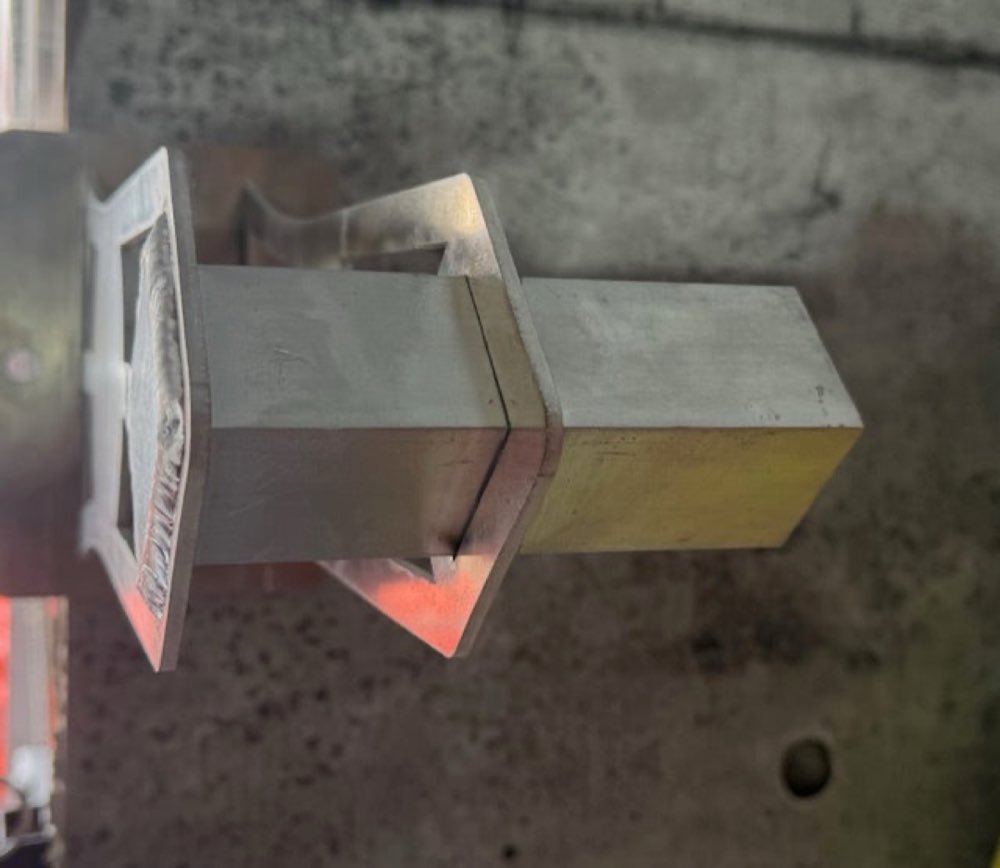 Front view of the aluminum wall / ceiling / floor mount bracket.