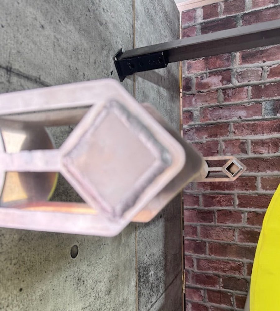 Side view of a pair of mounting brackets.
